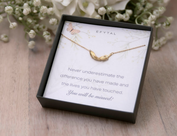 Dainty feather necklace finished in 14K gold with retirement message card that says: Never underestimate the difference you have made and the lives you have touched. You will be missed!