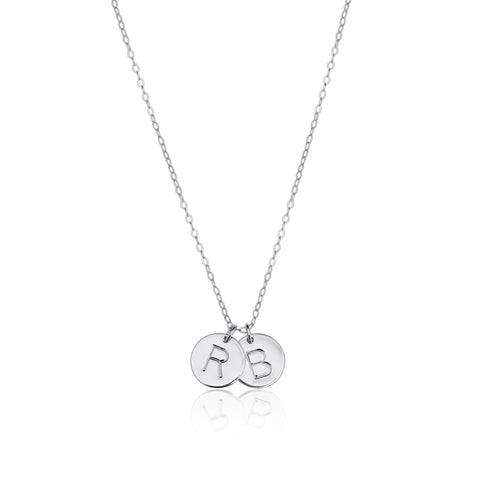 EFYTAL's 2 initial medium disc necklace in 925 sterling silver. Personalize by adding birthstones or additional charms.