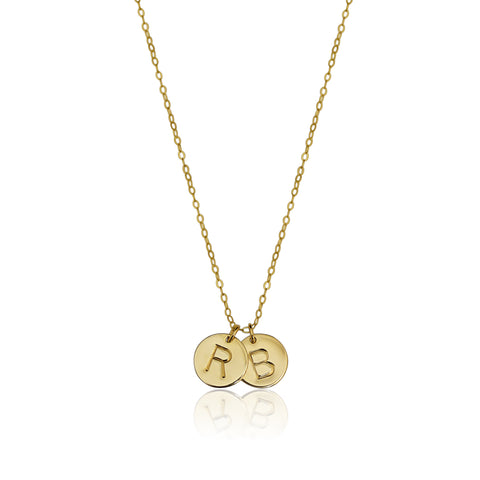 EFYTAL's hand stamped 2 initial medium disc necklace, shown here in 14K Gold Filled, is also available in 925 sterling silver. customize by adding birthstones or additional charms
