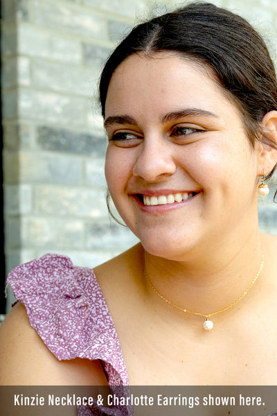 Floating pearl necklace shown here in 15" choker length.