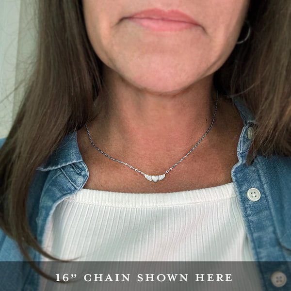 cara winged heart necklace • wherever you go