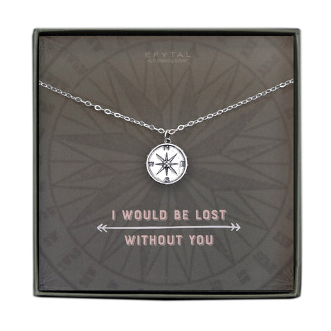 A grey jewelry box containing a grey message card with tonal compass motif. A 925 Sterling Silver necklace with a Sterling Silver dangling compass necklace. The white text on the card reads “EFYTAL 925 Sterling Silver” at the top and “I WOULD BE LOST WITHOUT YOU” at the bottom.  
