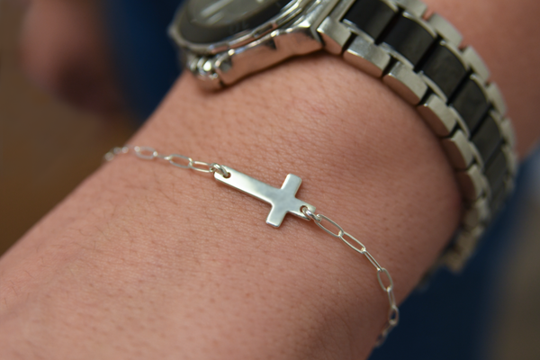 noah sideways cross bracelet • sisters