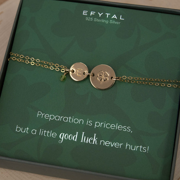 14K Gold Filled Lucky Charm bracelet with a hand stamped clover charm and initial charm, plus a little birthstone charm.