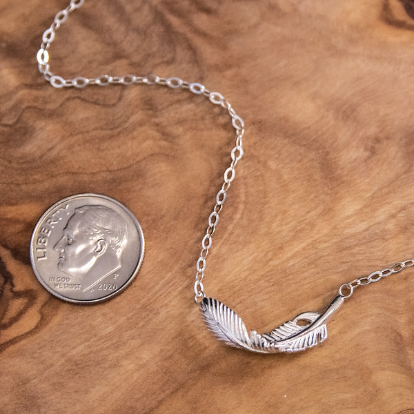 constance feather necklace, silver or gold • true friend tribe
