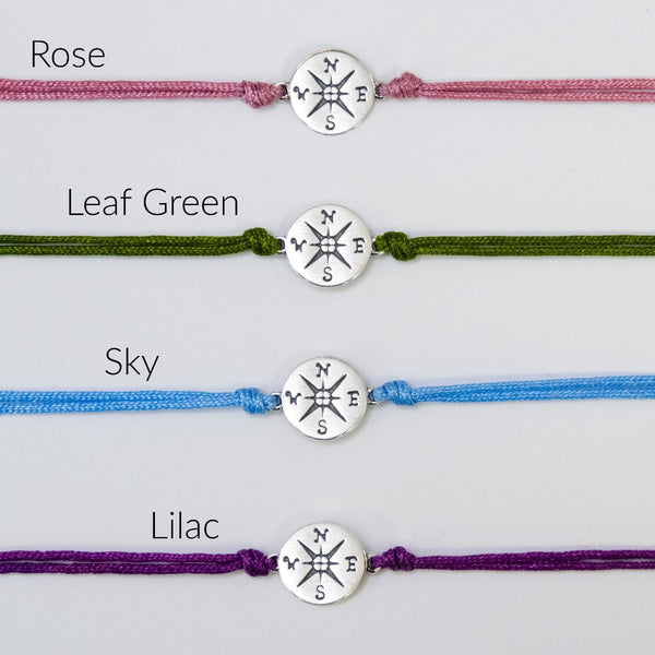 journey compass cord bracelet • adventure is an attitude