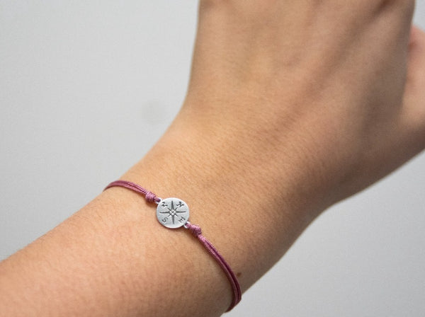 journey compass cord bracelet • adventure is an attitude