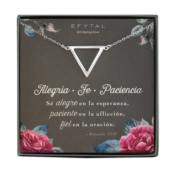 Sterling Silver triangular necklace with open cutout in the center. The card reads "EFYTAL 925 Sterling Silver" at the top and "Alegria Fe Paciencia Sé alegre en la esperanza, paciente en la aflicción, fiel en la oración. ~Romanos 12:12" at the bottom. There is a rose and rosebud motif on all four corners of the card. 