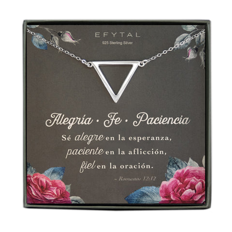 Sterling Silver triangular necklace with open cutout in the center. The card reads "EFYTAL 925 Sterling Silver" at the top and "Alegria Fe Paciencia Sé alegre en la esperanza, paciente en la aflicción, fiel en la oración. ~Romanos 12:12" at the bottom. There is a rose and rosebud motif on all four corners of the card. 