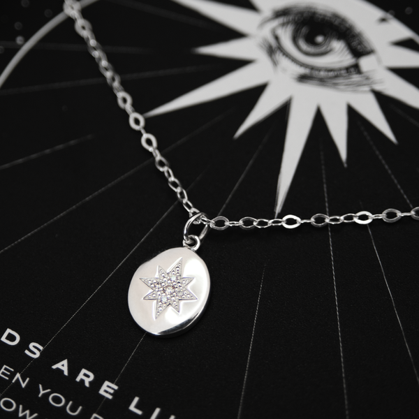 ester oval starburst necklace • friends are like stars